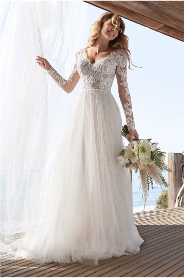 Model wearing a bridal Rebecca Ingram gown