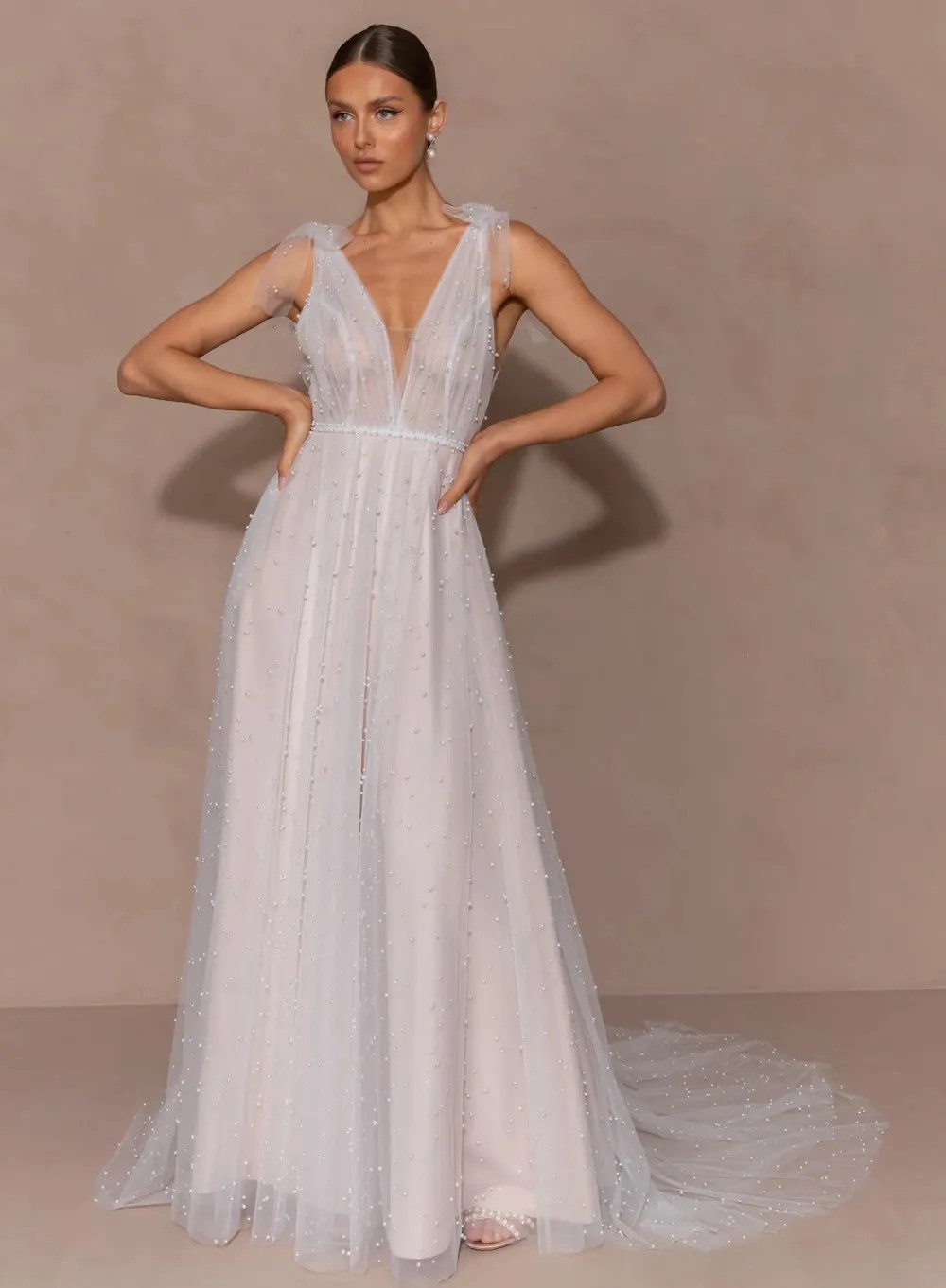 Model wearing a bridal Evie Young gown