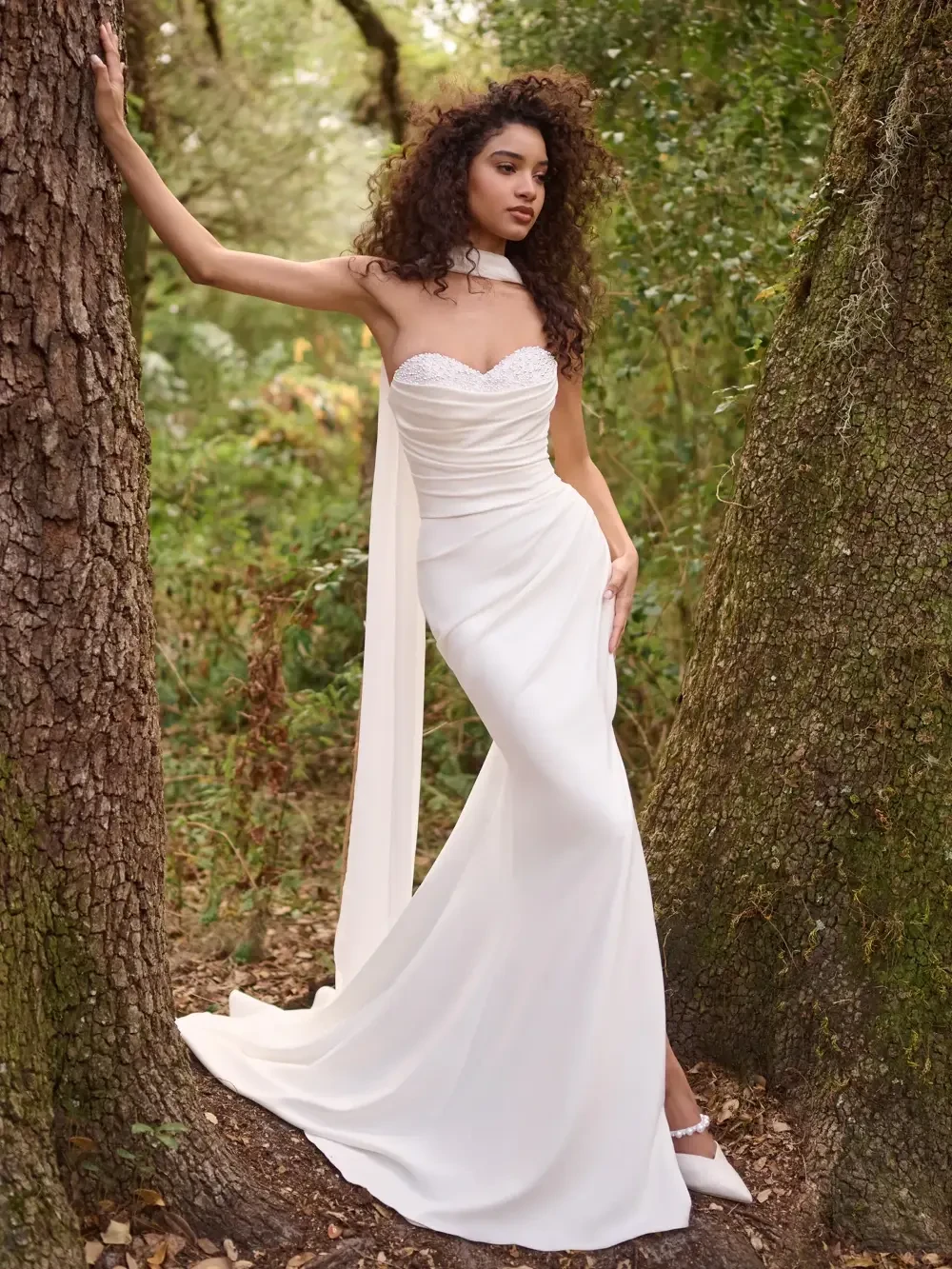 Model wearing a bridal Rebecca Ingram gown