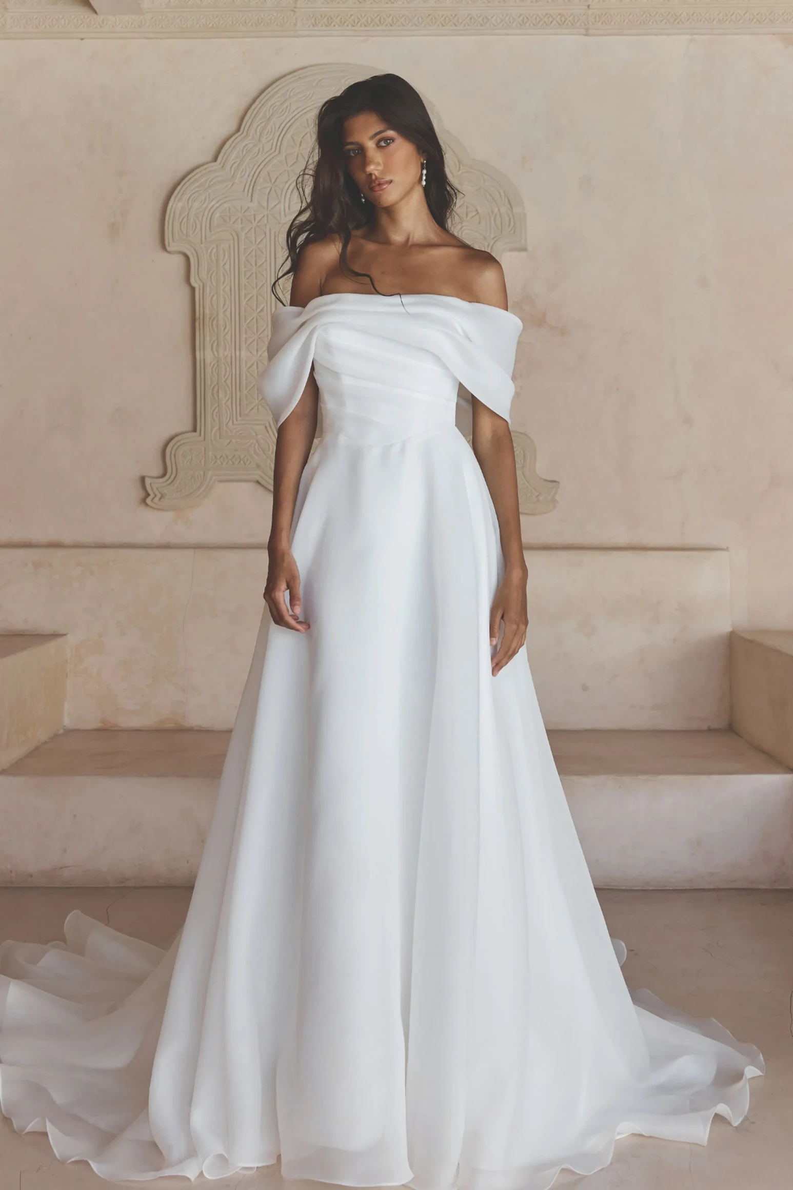 Model wearing a bridal Madi Lane gown