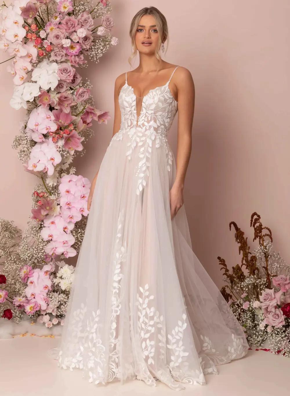 Model wearing a bridal Madi Lane gown