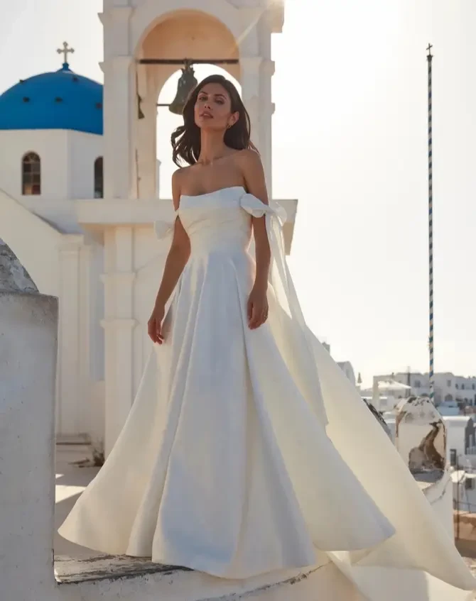 Model wearing an ivory Bridal Gown